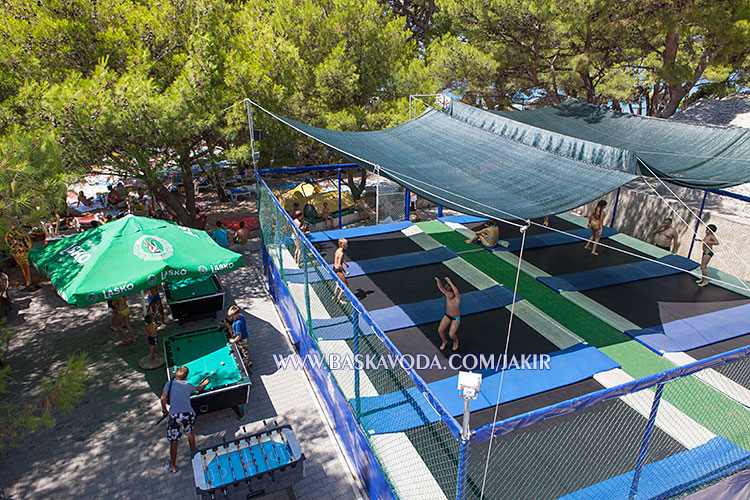 Childen games on beach in summer time, Baška Voda